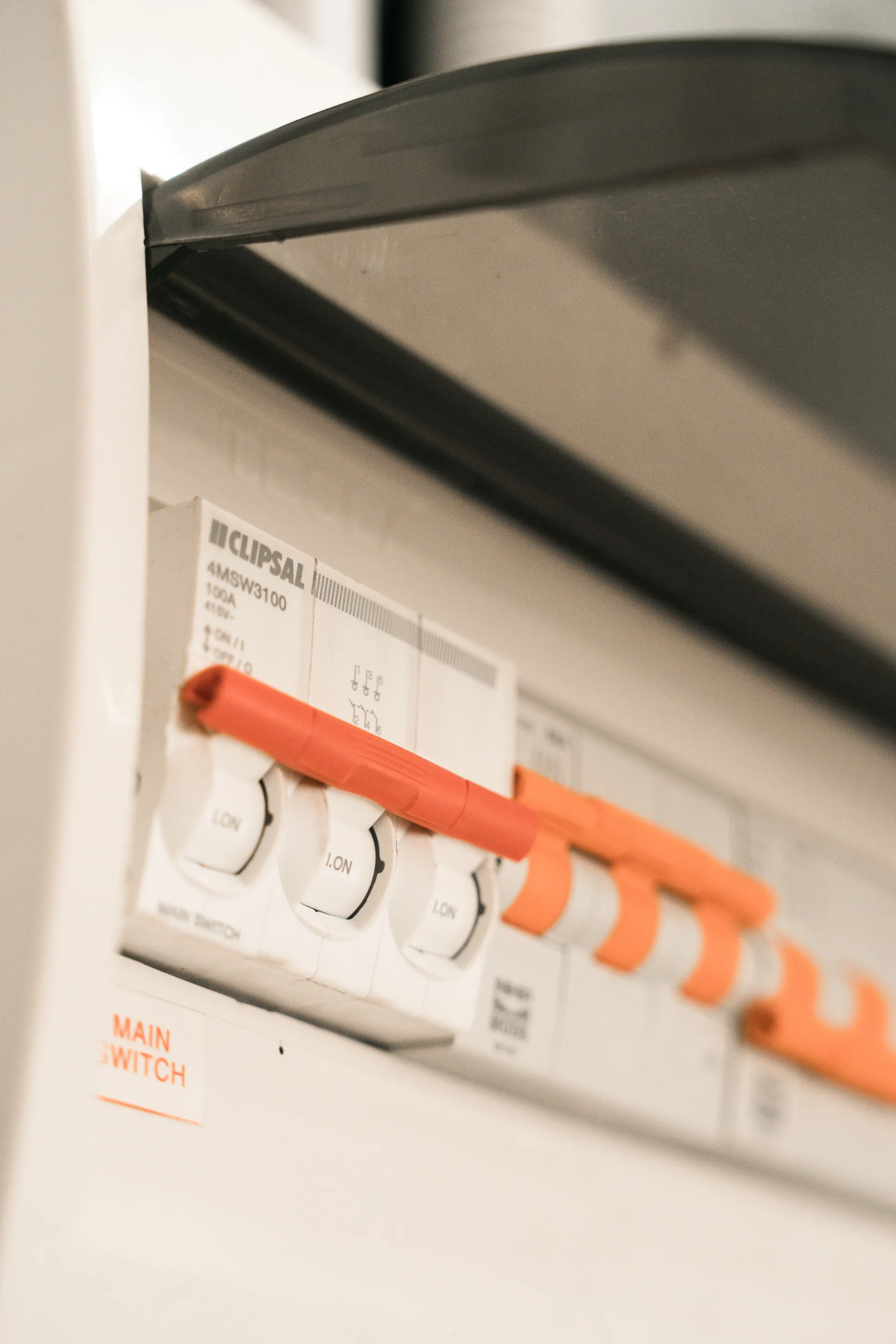 Close-up of circuit breakers in a distribution board