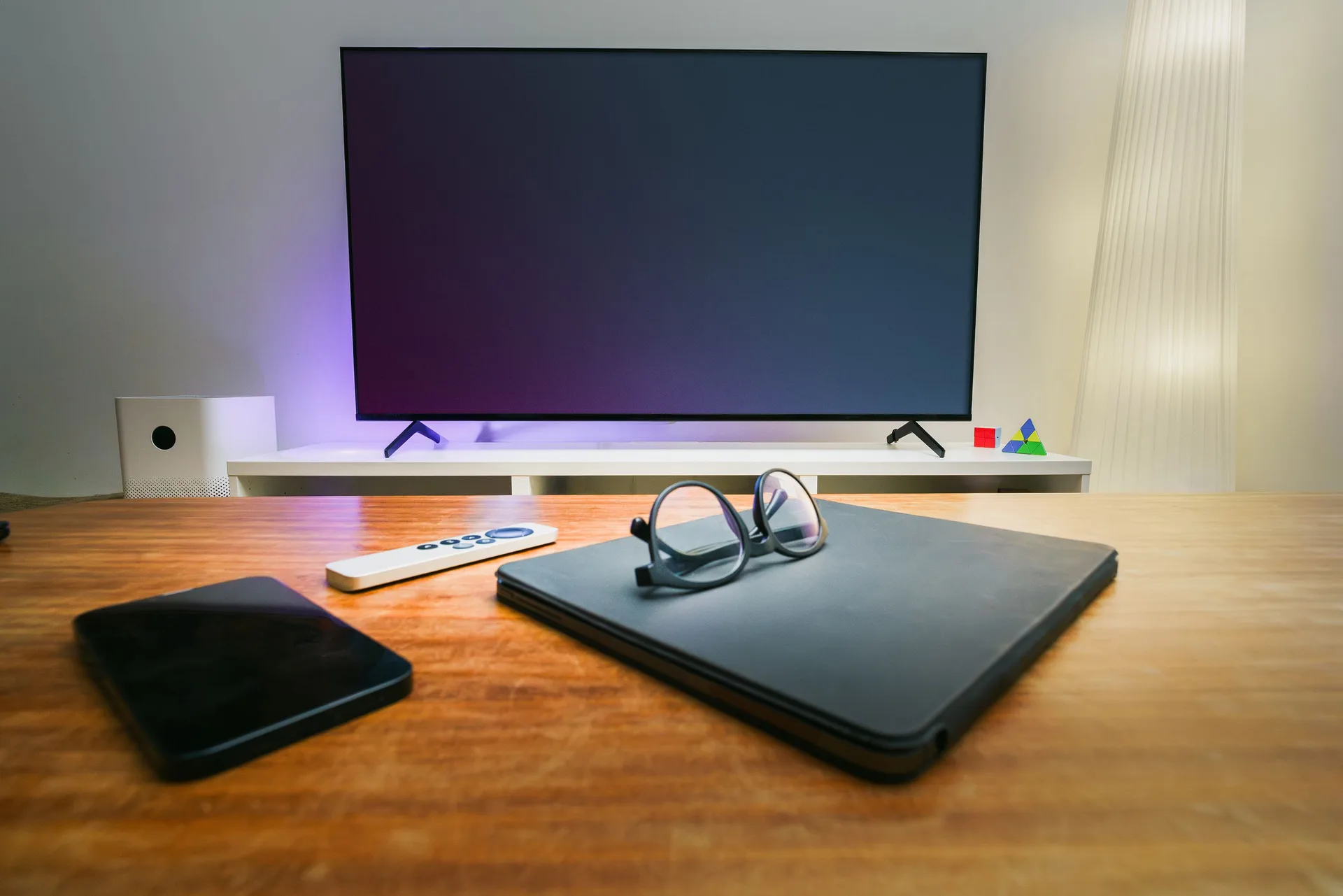 A living room with smart devices and modern decor